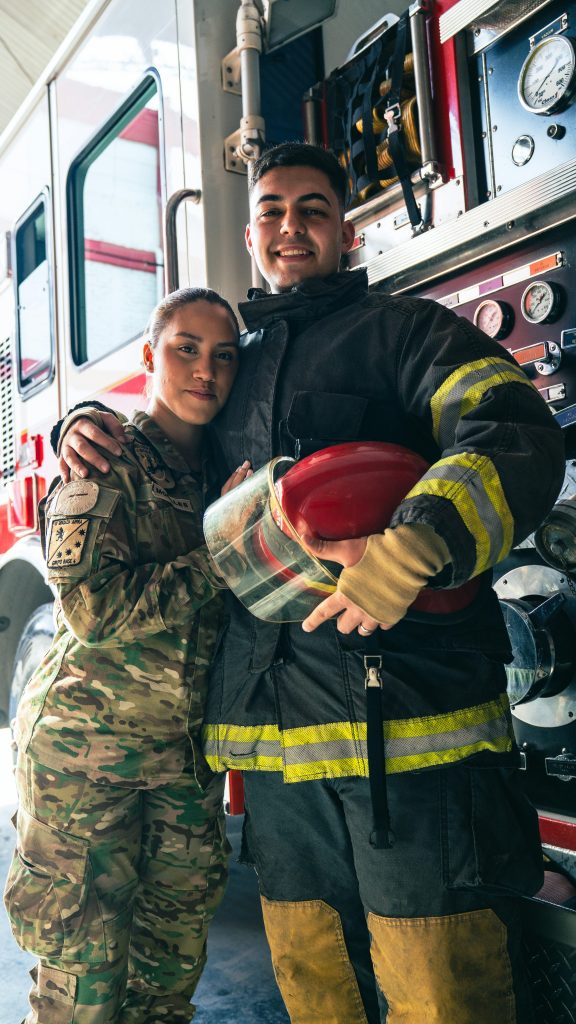 photo of firefighter and army woman